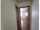 Clean hallway with light walls and wood flooring at 1321 Del Mar St # 4, Las Vegas, NV 89119