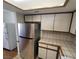 Stainless steel refrigerator in updated kitchen at 1321 Del Mar St # 4, Las Vegas, NV 89119