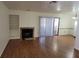 Living room with hardwood floors and fireplace at 1321 Del Mar St # 4, Las Vegas, NV 89119