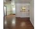 Open living area with hardwood floors and dining area at 1321 Del Mar St # 4, Las Vegas, NV 89119