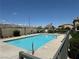 Community swimming pool with mountain view at 3205 Mystic Ridge Ct, Las Vegas, NV 89129