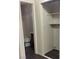 Bathroom doorway and a closet with shelves at 5049 Spencer St # D, Las Vegas, NV 89119