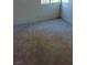 Well-lit bedroom featuring plush carpet and natural light from a window at 5049 Spencer St # D, Las Vegas, NV 89119