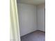 This bedroom offers a neutral palette, carpet and built-in closet for organized living at 5049 Spencer St # D, Las Vegas, NV 89119