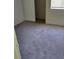 This bedroom features a closet, window, neutral walls and carpet at 5049 Spencer St # D, Las Vegas, NV 89119
