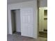 The bedroom boasts a closet with sliding doors, and is next to another bedroom at 5049 Spencer St # D, Las Vegas, NV 89119