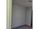 The carpeted bedroom offers a large closet with sliding doors at 5049 Spencer St # D, Las Vegas, NV 89119