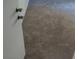 Hallway provides a glimpse of the interior, showcasing the flooring and door hardware at 5049 Spencer St # D, Las Vegas, NV 89119