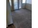 Living room with patio doors offering access to the outside at 5049 Spencer St # D, Las Vegas, NV 89119