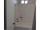 Bathroom featuring a clean shower with a window at 5049 Spencer St # D, Las Vegas, NV 89119
