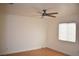 Spacious bedroom with hardwood floors and ceiling fan at 1708 Walrus St, Las Vegas, NV 89117