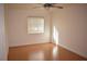 Bright bedroom with hardwood floors and window at 1708 Walrus St, Las Vegas, NV 89117