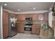 Kitchen with stainless steel appliances and granite countertops at 1708 Walrus St, Las Vegas, NV 89117