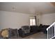 Living room with sectional sofa and a chandelier at 1708 Walrus St, Las Vegas, NV 89117