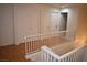 Upstairs hall with hardwood floors and doors at 1708 Walrus St, Las Vegas, NV 89117