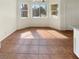 Bright dining area with tile flooring and window at 900 Boulder Springs Dr # 202, Las Vegas, NV 89128