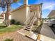 Exterior view of condo with stairs and landscaping at 900 Boulder Springs Dr # 202, Las Vegas, NV 89128