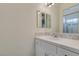 Simple bathroom with single sink and mirror at 1860 E Ford Ave, Las Vegas, NV 89123