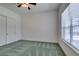 Bright bedroom with double door closet and carpet flooring at 1860 E Ford Ave, Las Vegas, NV 89123