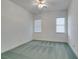 Bright bedroom featuring two windows and ceiling fan at 1860 E Ford Ave, Las Vegas, NV 89123