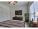 Comfortable bedroom with large TV and ample closet space at 1860 E Ford Ave, Las Vegas, NV 89123