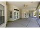 Covered patio with double doors and ceiling fan at 1860 E Ford Ave, Las Vegas, NV 89123