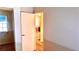 Bedroom with mirrored closet and access to living area at 5860 Medallion Dr # 202, Las Vegas, NV 89122