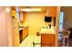 Bright kitchen features light wood cabinets, and a full appliance package at 5860 Medallion Dr # 202, Las Vegas, NV 89122