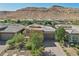 Single-story home with desert landscape and mountain views at 10057 Regency Canyon Way, Las Vegas, NV 89148