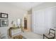 Bright bedroom with a large closet and a console table at 10057 Regency Canyon Way, Las Vegas, NV 89148