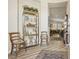 Elegant entryway with a glass-front cabinet and seating at 10057 Regency Canyon Way, Las Vegas, NV 89148