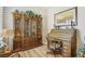 Bright home office features built-in wooden desk and shelving at 10057 Regency Canyon Way, Las Vegas, NV 89148