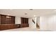 Finished basement with built-in shelving and ample storage space at 7668 Gossamer Wind St, Las Vegas, NV 89139