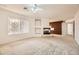 Large living room with fireplace and built-in cabinetry at 7668 Gossamer Wind St, Las Vegas, NV 89139