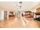 Bright and airy living room with hardwood floors and fireplace at 7668 Gossamer Wind St, Las Vegas, NV 89139