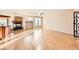 Bright living room with hardwood floors and a fireplace at 7668 Gossamer Wind St, Las Vegas, NV 89139