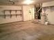 This large garage has space for storage, utility components, and interior access to home at 841 Lusterview Ct, Las Vegas, NV 89123