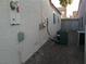 Small gravel side yard with wall and AC units at 841 Lusterview Ct, Las Vegas, NV 89123