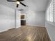 Spacious living room featuring hardwood floors and ceiling fan at 6019 Clark St, Las Vegas, NV 89122