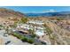 Aerial view of community with pool and mountain views at 687 Marina Dr # 39, Boulder City, NV 89005