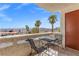 Spacious balcony with scenic mountain views and seating for two at 687 Marina Dr # 39, Boulder City, NV 89005