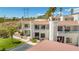 Two-story building exterior with Spanish-style architecture and landscaping at 687 Marina Dr # 39, Boulder City, NV 89005