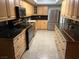 Modern kitchen with stainless steel appliances and wood cabinets at 687 Marina Dr # 39, Boulder City, NV 89005