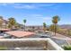 View of community parking lot with mountain backdrop at 687 Marina Dr # 39, Boulder City, NV 89005