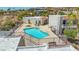 Community pool with surrounding patio and building views at 687 Marina Dr # 39, Boulder City, NV 89005