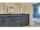 Contemporary bathroom with double vanity and a walk-in shower at 7132 Mission Hills Dr, Las Vegas, NV 89113