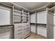 Large walk-in closet with ample shelving and hanging space at 7132 Mission Hills Dr, Las Vegas, NV 89113