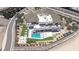 Aerial perspective of luxury home highlighting multiple balconies, pool, meticulously landscaped grounds, and privacy at 12 Oakmont Hills Ln, Las Vegas, NV 89141