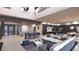Spacious modern living room with high ceilings, wine rack, bar, and an open layout at 12 Oakmont Hills Ln, Las Vegas, NV 89141