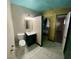 Small bathroom with teal ceiling and dark vanity at 1310 Fremont St, Pahrump, NV 89048